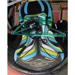 SLEDS WITH HOCKEY HELMET