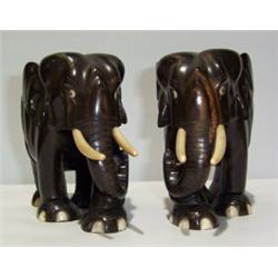 A PAIR VICTORIAN EBONY ELEPHANT FIGURES, with ivory tusk, eyes and toes 50 - 100...