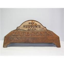 A CAST IRON DOGS WATER BOWL, advertising Hudson's soap 30 - 50...