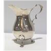 Image 1 : A PRETTY SILVER CREAM JUG, London 1949 100 - 120...
