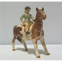 A BESWICK 'GIRL ON HORSE FIGURE'. HN1499 150 - 200...