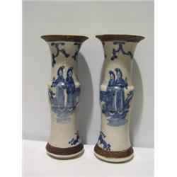 A PAIR OF CONTINENTAL EWERS, highly decorated with flowers and cherubs - A.F 30 - 50...