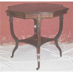 AN EDWARDIAN ROSEWOOD CENTRE TABLE, with shaped octagonal top & central motif shaped legs & lower s.