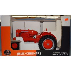 2 toys: Allis WD45 tractor, 1:8, NIB and NH 664 round baler, 1:16, Scale Models, NIB