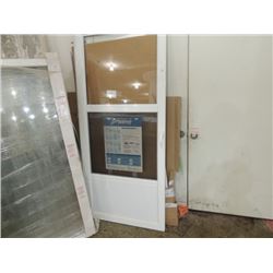 BRAND NEW STORM DOOR WITH HARDWARE $500