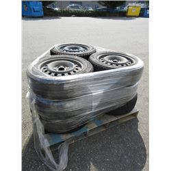 Skid of 9 tires with rims - used