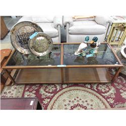 Wood coffee table with smoked glass inserts