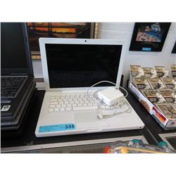Mac Book with adapter - used