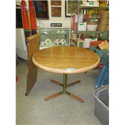 Round oak dining table with leaf - used