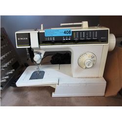 Singer sewing machine with pedal - used