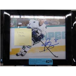 Autographed - Luca Sbisa framed hockey photo