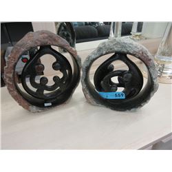 2 Carved stone statues
