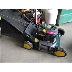 Gas powered lawnmower with bag attachment