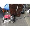 Image 1 : Gas powered lawnmower - used