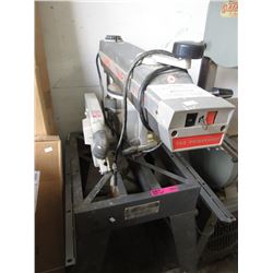 Radial arm saw on stand - used