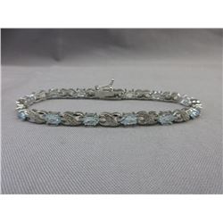 Blue Topaz & Diamond Tennis Bracelet