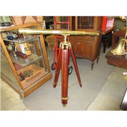 Brass telescope on tripod stand