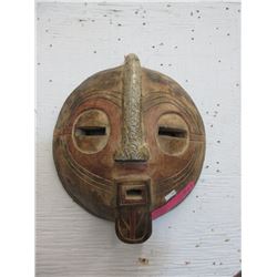 Carved wood wall mask