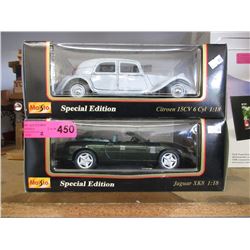 2 Die-cast scale model cars