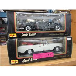 2 Die-cast scale model cars