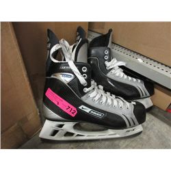 Man's size 12 Bauer Supreme Hockey Skates - used