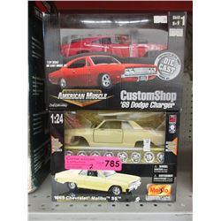 2 Die-cast scale model cars