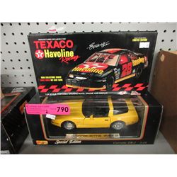 2 Die-cast scale model cars