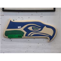 Laurence Andrews carved Seahawk plaque