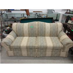 Roll armed upholstered sofa - used