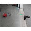 Image 1 : Gas powered weed eater - used