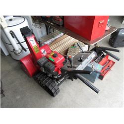 Gas powered snow thrower - used