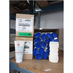18 Tubes of sunscreen & 2 cases of blackhead scrub