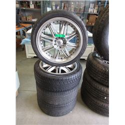 4 Ecsta 4x tires on aluminum sport rims.