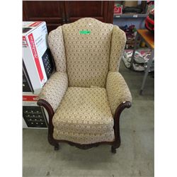 Upholstered vintage wing back chair - used