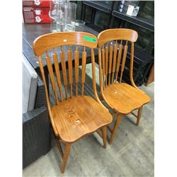 Pair of spindle back oak chairs - used