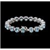 Image 2 : 14KT White Gold 27.80ctw Topaz and Diamond Bracelet