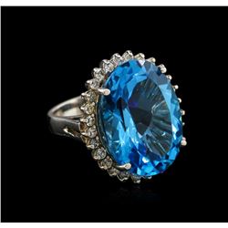 14KT White Gold 26.80ct Blue Topaz and Diamond Ring