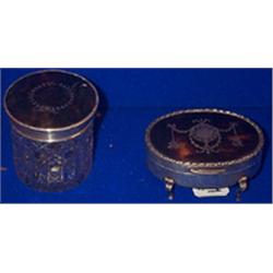 A SILVER MOUNTED TORTOISESHELL DRESSING TABLE BOX, LONDON 1929; and an oval example with torto...