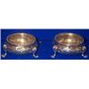 Image 1 : A PAIR OF EMBOSSED CIRCULAR SALT CELLARS, LONDON 1881, with beaded rims, each raised on three...
