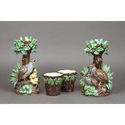 A PAIR OF MAJOLICA STANDS, PROBABLY GEORGE JONES, 19th CENTURY, in the form of partridges nest...