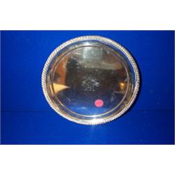 A SHEFFIELD PLATED SALVER, EARLY 19th CENTURY, with gadrooned rim, the let-in silver centre en...