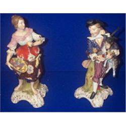 A PAIR OF PORCELAIN FIGURES, GERMAN, 19th CENTURY, of a shepherd and shepherdess hatched mark...