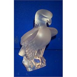 A lalique CLEAR AND FROSTED GLASS MODEL OF AN EAGLE, the base signed Lalique, France 23cms hig...