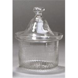 A MOULDED PLAIN BUTTER DISH AND COVER, BY THE WATERLOO GLASS COMPANY, CORK, EARLY 19th CENTURY...