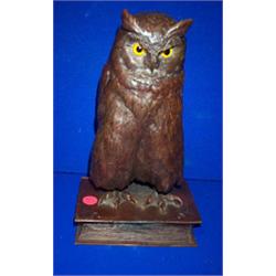A BRONZE FIGURE OF AN OWL, standing on a book after the model by Bergman of Vienna 280cms high...