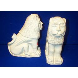 A PAIR OF WHITE GLAZED POTTERY FIGURES OF SEATED LIONS, GERMAN, PROBABLY 16th/17th CENTURY 24c...