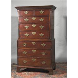 A MAHOGANY CHEST ON CHEST, 18th CENTURY, with moulded cornice above a dentil frieze, the top p...
