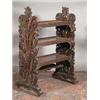 Image 1 : A CARVED STAINED ROSEWOOD DUMB WAITER, 19th CENTURY, PROBABLY INDO-BURMESE, with three galleri...