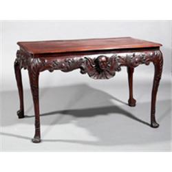 A MAHOGANY SIDE TABLE, IRISH, MID 18th CENTURY, the associated moulded mahogany top with round...