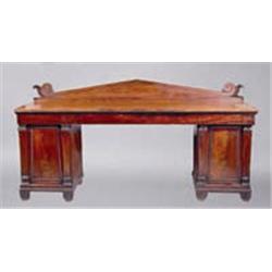 A MAHOGANY SIDEBOARD, c.1820, IN GRECIAN TASTE, panelled triangular gallery, the rectangular t...